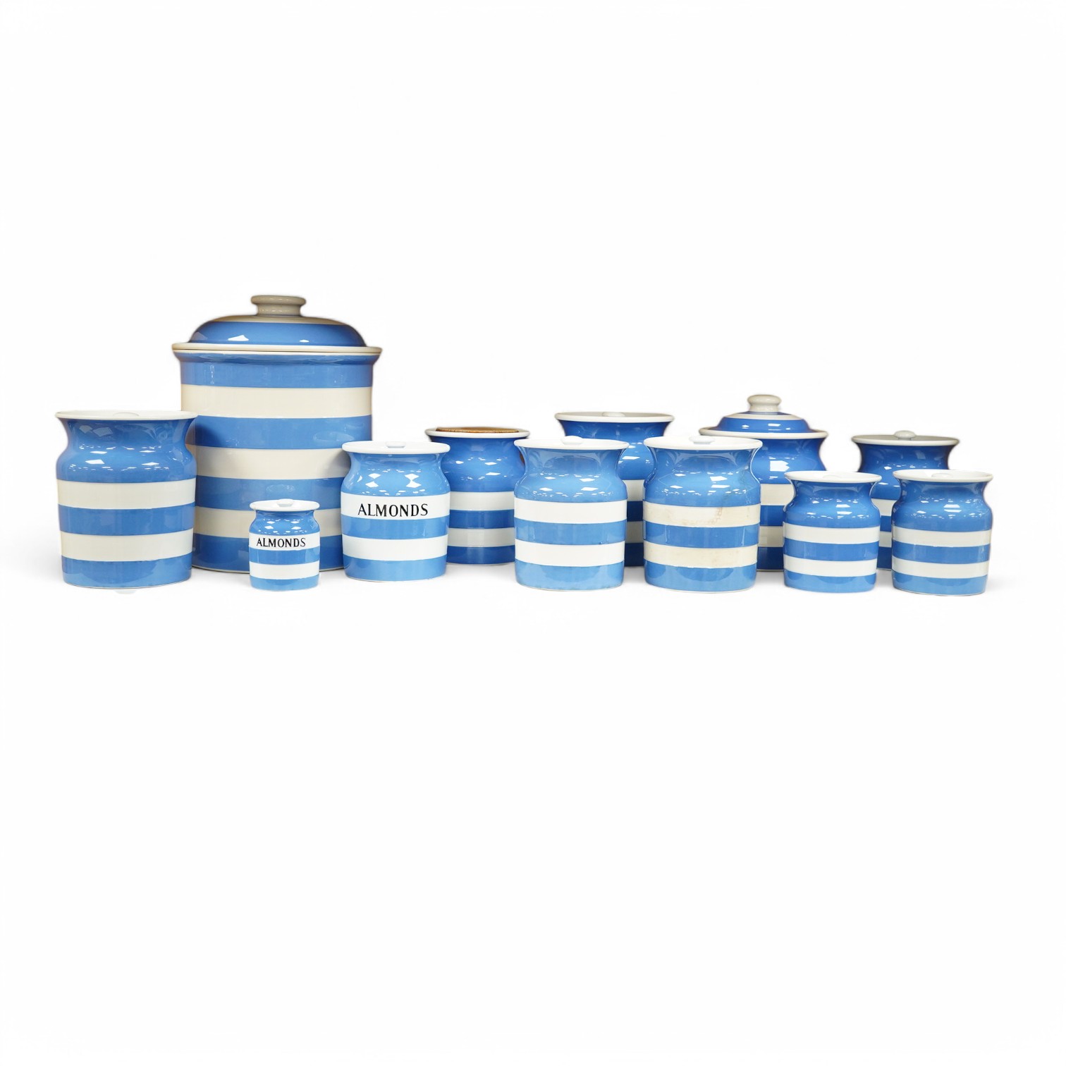 A quantity of T. G. Green ‘Cornishware’, kitchen storage jars and covers, tallest bread bin and cover 29cm high. Condition - some staining and crazing, mostly good